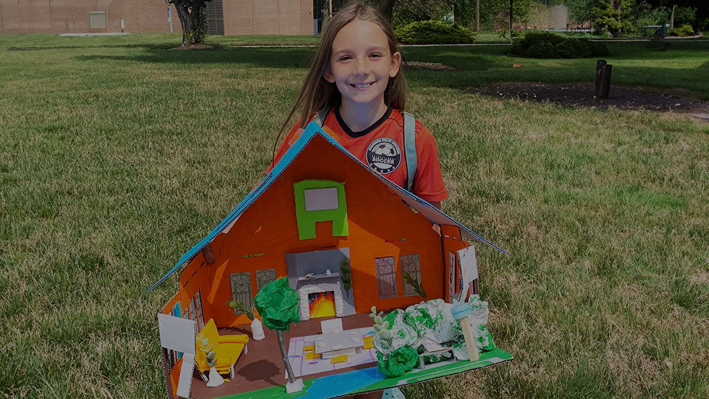 Young student presenting her interior design project at Aneta Art Classes in Schaumburg